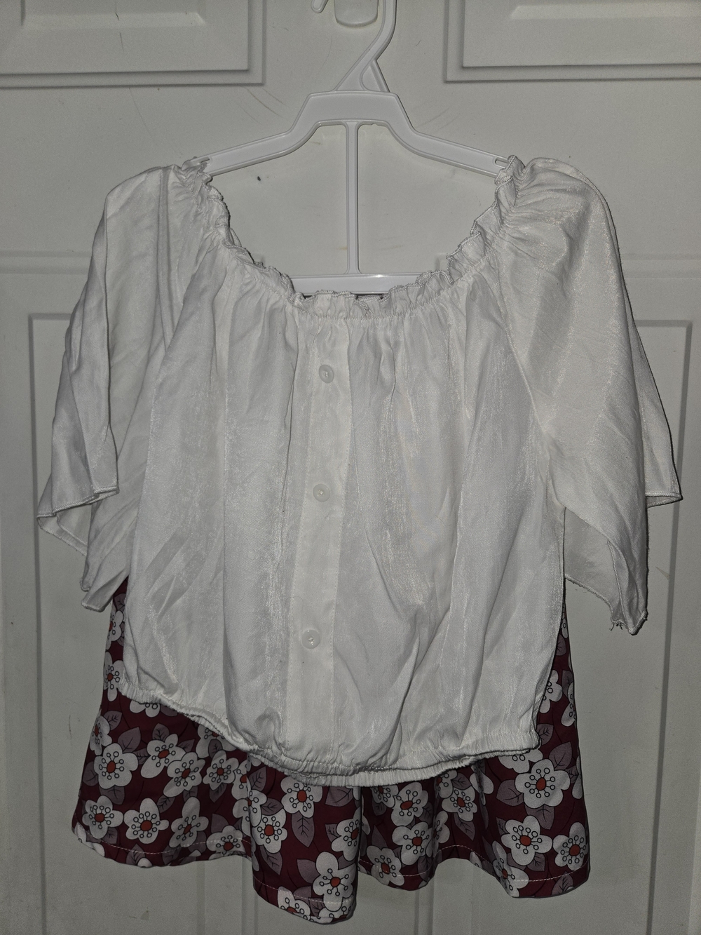 White Button-Front Off-Shoulder Top with Floral Skirt.
